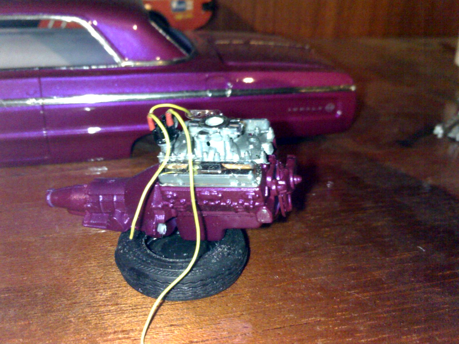 motor e ao fundo carroceria.